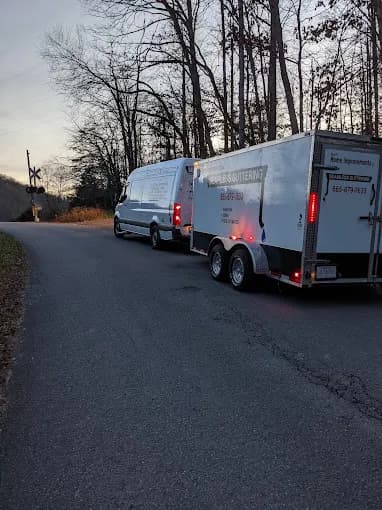 East TN Home Improvements service trailer on a Knoxville-area gutter project route